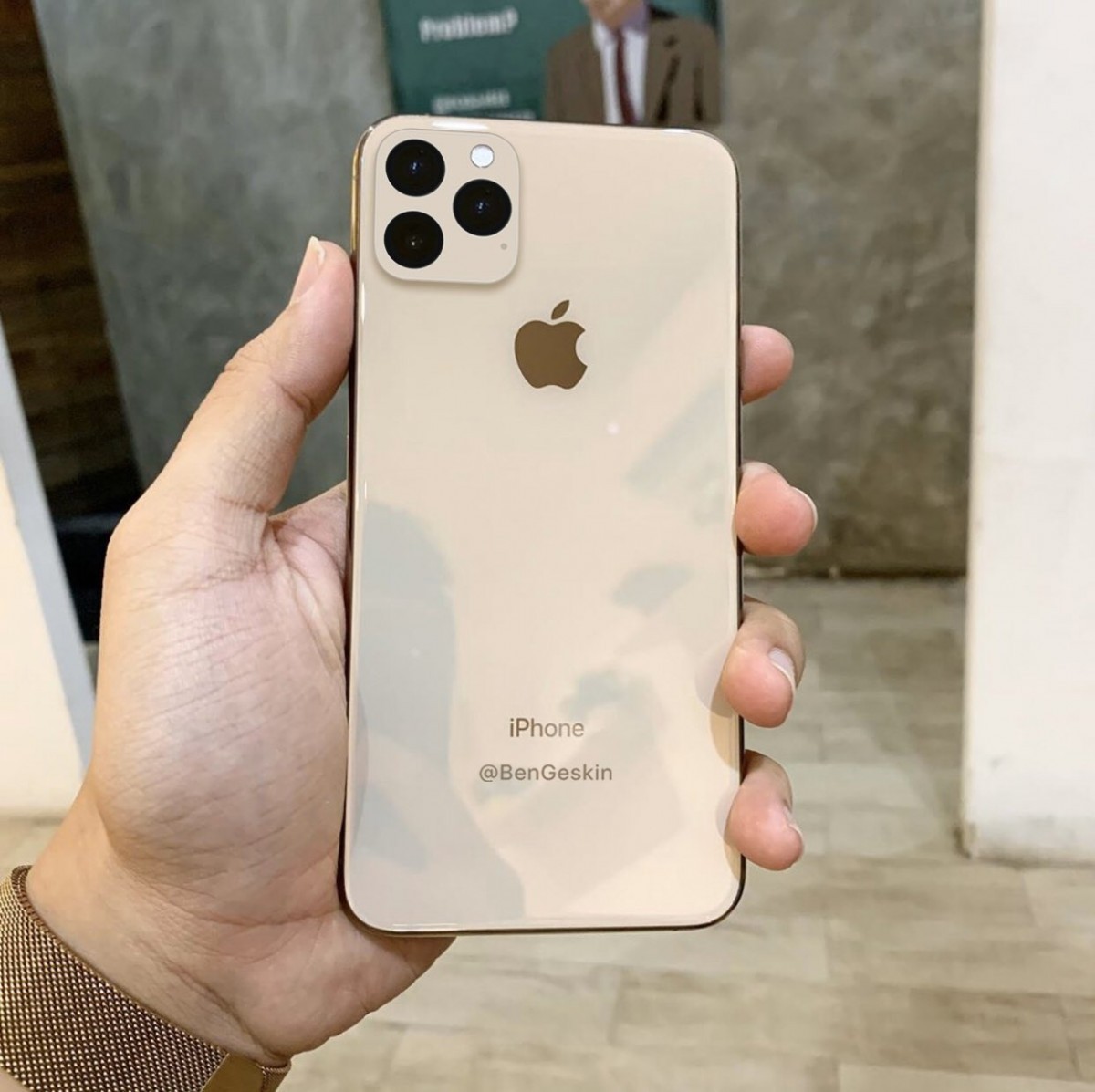 The iPhone 11 (XI) is shown in gold color
